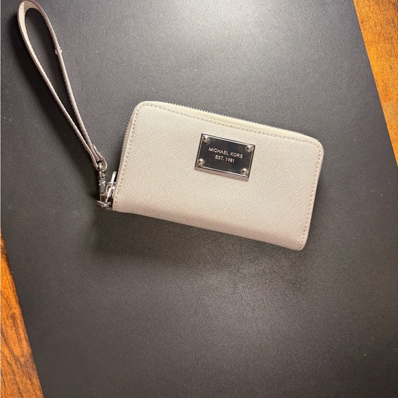 Michael Kors Handbags - Michael Kors Cream Wristlet with Silver Accents